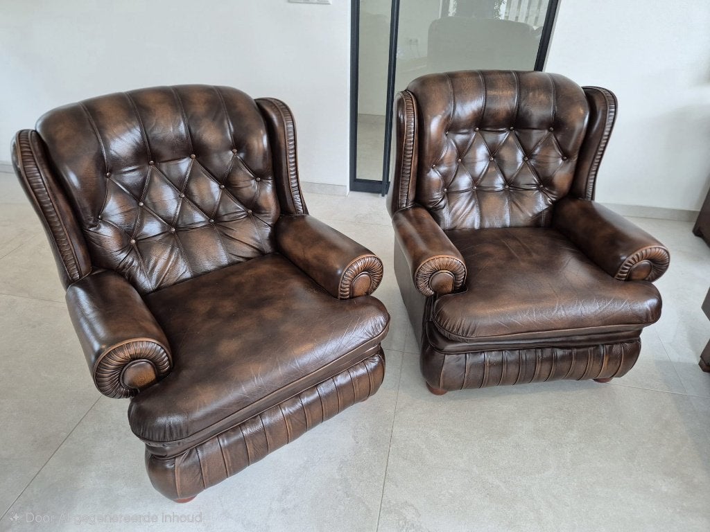 2x Engelse leren oorfauteuil (Chesterfield), Huis en Inrichting, Fauteuils, Ophalen, Gebruikt, 75 tot 100 cm, Leer