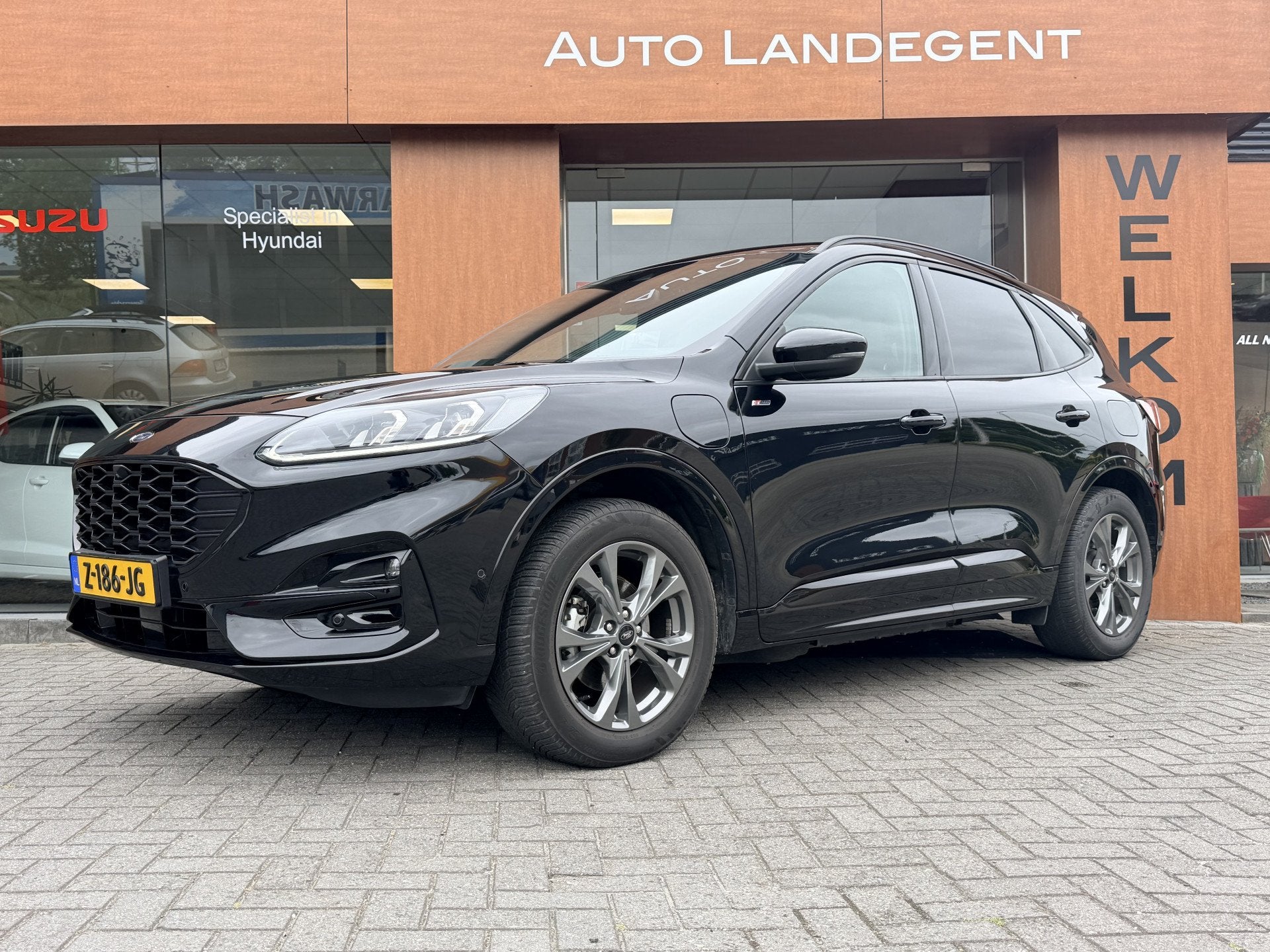 Ford Kuga 2.5 PHEV ST-Line | Carplay | Stoel/ Stuur verwarmi, Auto's, 12 maanden, Gebruikt, 4 cilinders, Zwart