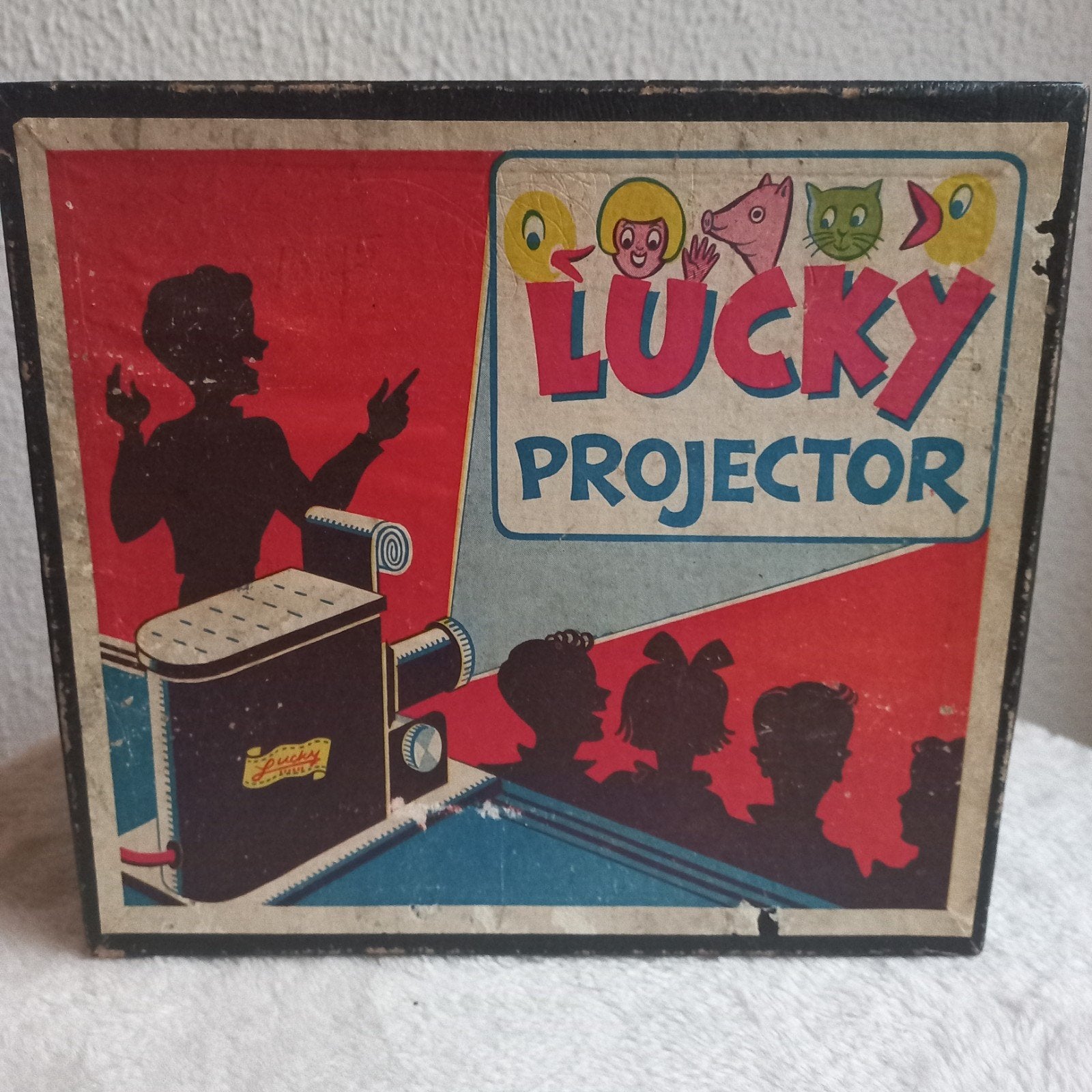 Vintage Lucky Projector met filmstroken en originele doos, Ophalen of Verzenden, Gebruikt