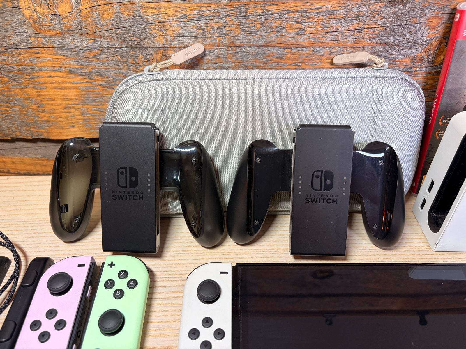 Foto 6 van Nintendo Switch OLED met extra controllers en games
