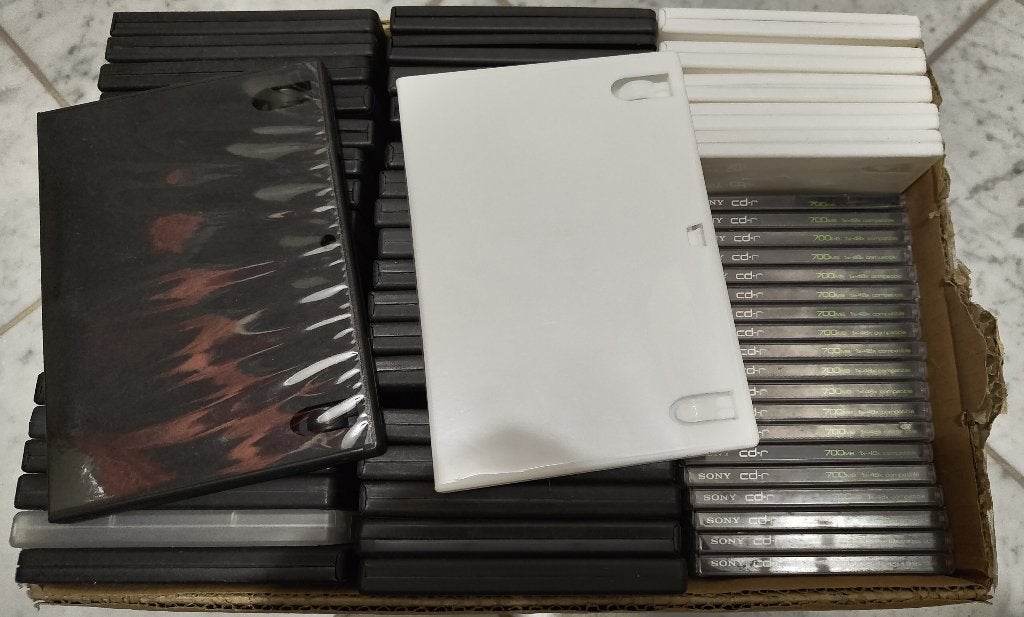 partijtje dvd dozen en cd dozen wit,zwart,transparant ca 40, Computers en Software, Ophalen of Verzenden, Nieuw, Dvd, Herschrijfbaar