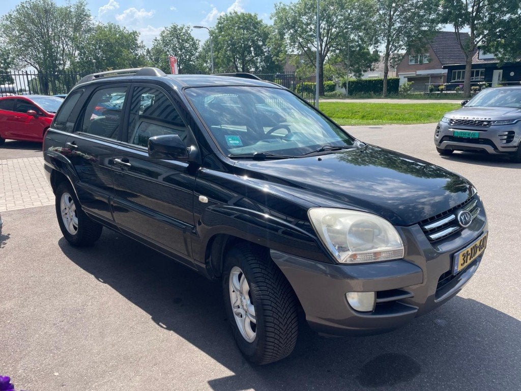 Kia SPORTAGE 2.0 CVVT X-ECUTIVE Trekhaak - Airco - Cruise, 1442 kg, USB, 142 pk, 4 cilinders