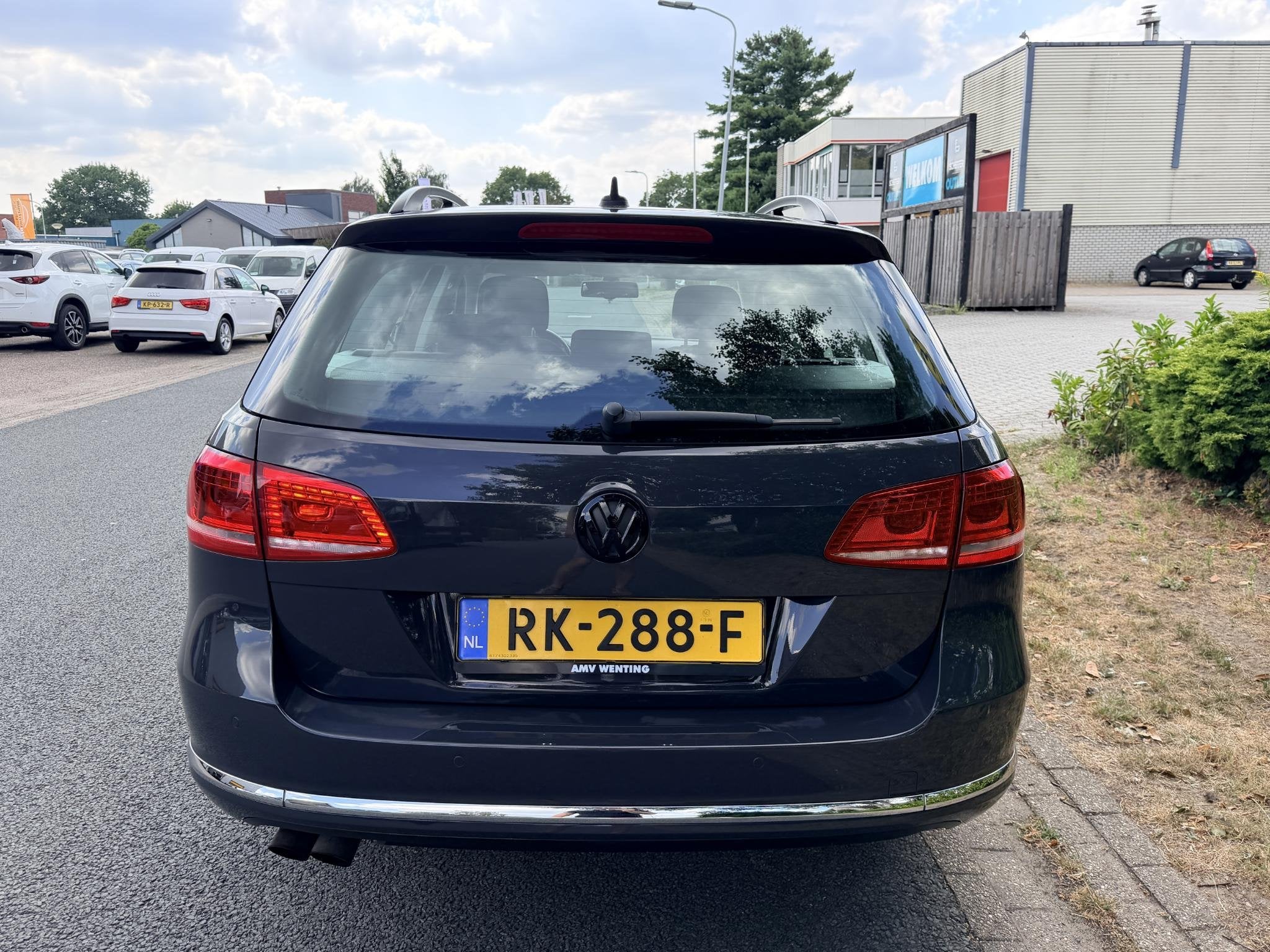 Volkswagen Passat Variant 2.0 TSI Highline 211PK DSG•Xenon, Auto's, Euro 5, Stof, Gebruikt, Zwart