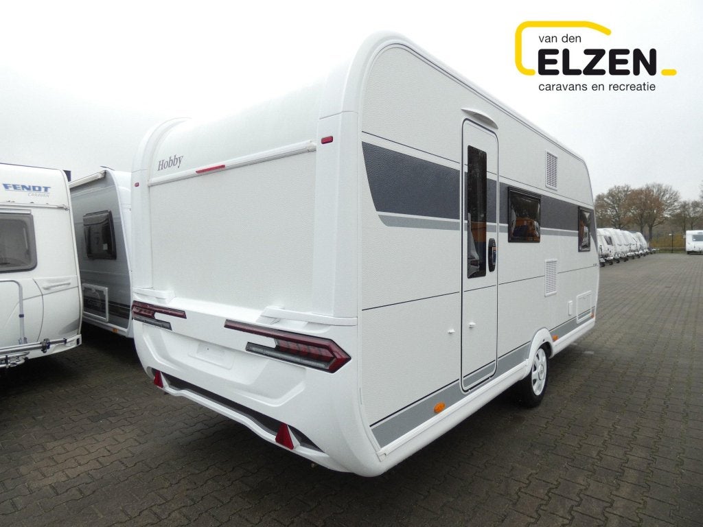 Hobby De Luxe 490 KMF actie prijs, incl. opties, Caravans en Kamperen, Caravans, Dwarsbed, Hobby, Bedrijf, Treinzit