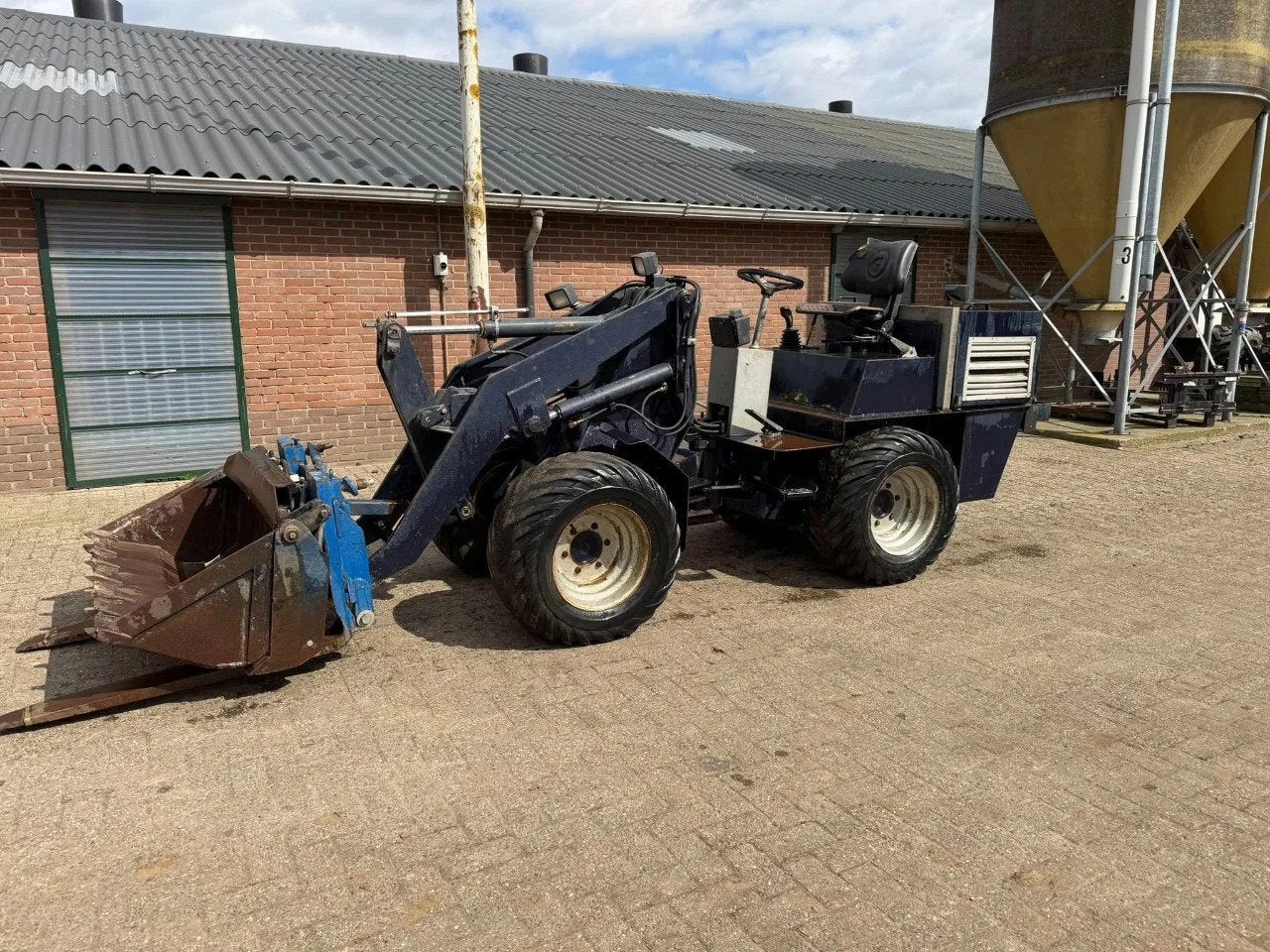 Weidemann 2002 D/M 2002 D/M (bj 1998), Wiellader of Shovel