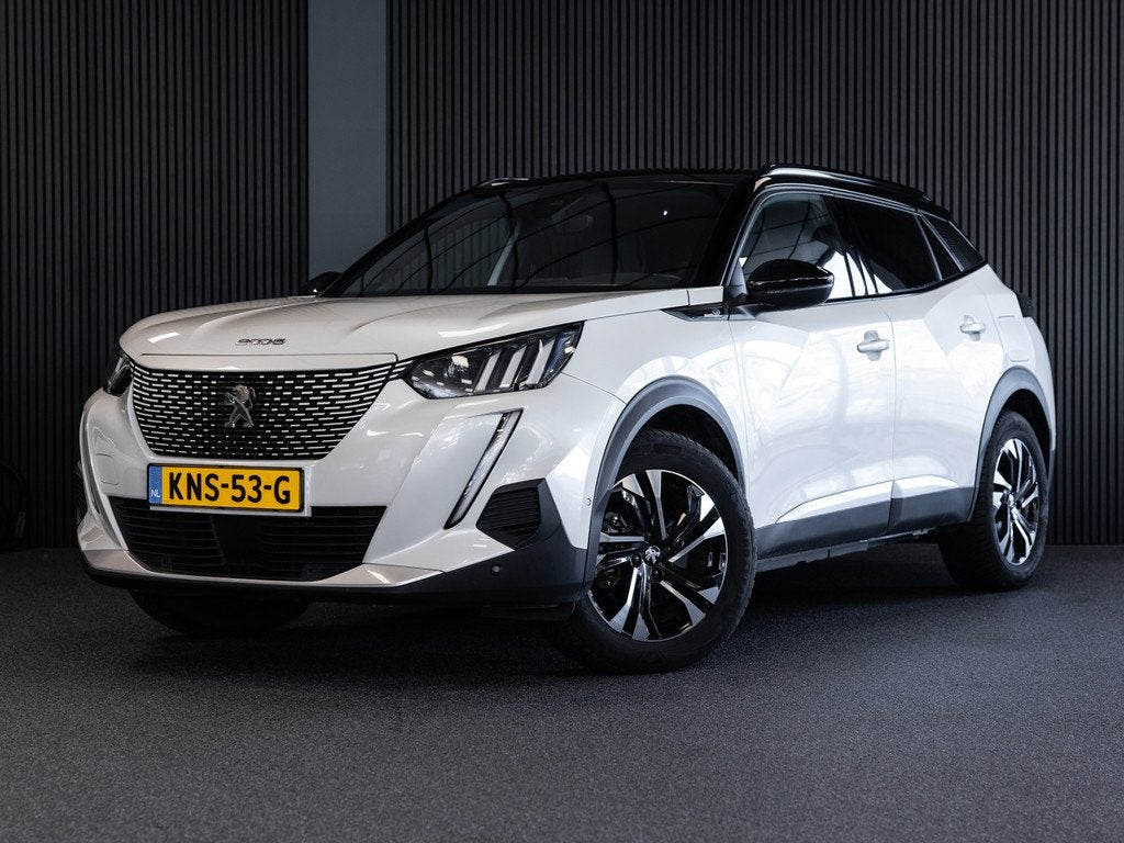 Peugeot E-2008 EV 54kWh l GT Line l SoH 96% l CAM. l 1ste ei, Auto's, Peugeot, 330 km, 136 pk, Gebruikt, Zwart