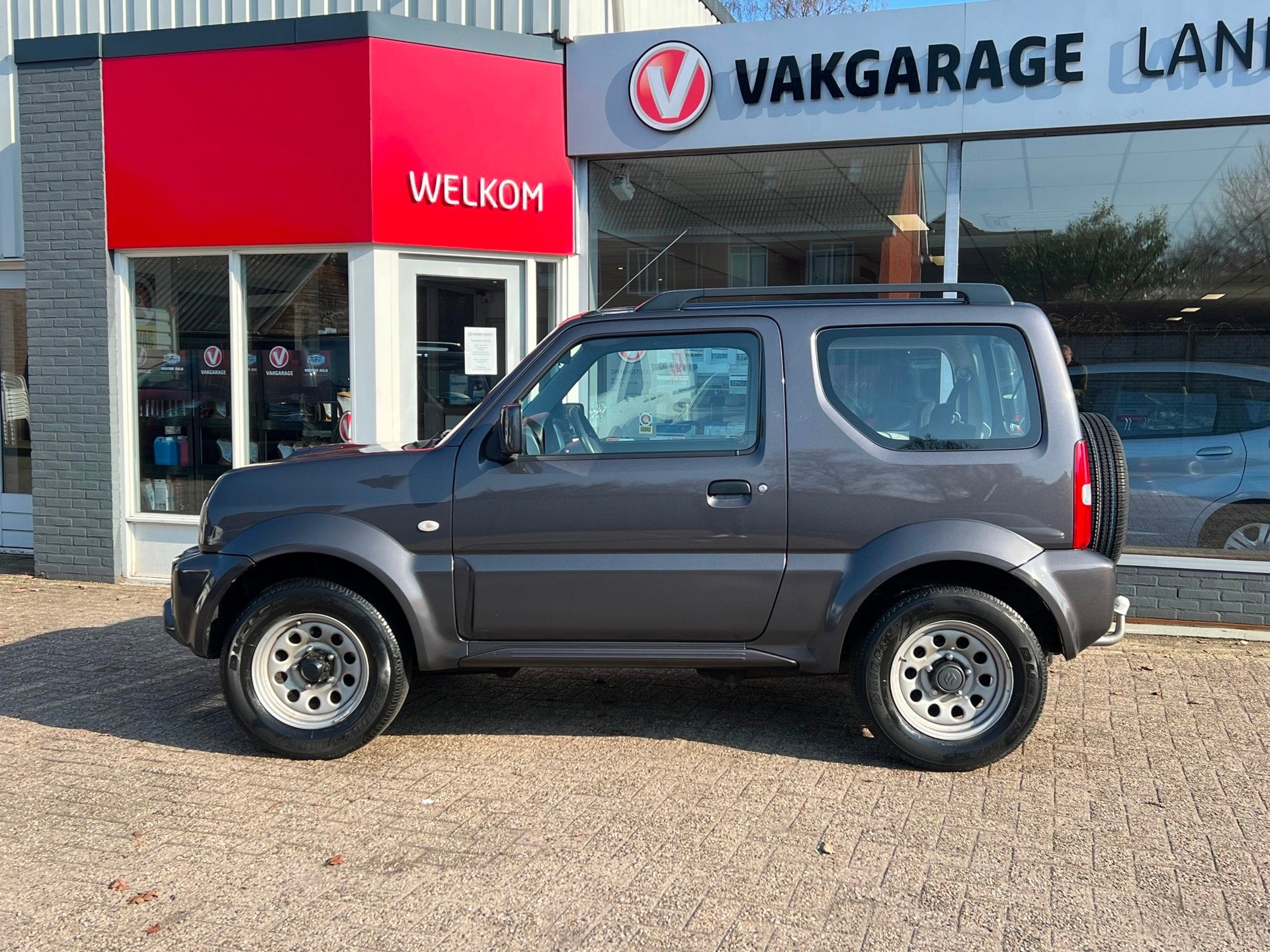 Suzuki Jimny 1.3 automaat, Trekhaak, 1e eigenaar., Auto's, Automaat, Dealer onderhouden, Gebruikt, Zwart