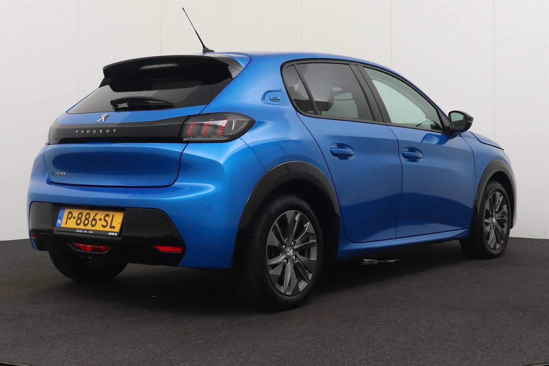 Peugeot e-208 EV Allure 50 kWh (93%SOH) Half-Leder Camera Cl, Auto's, Dealer onderhouden, 136 pk, Gebruikt, Zwart
