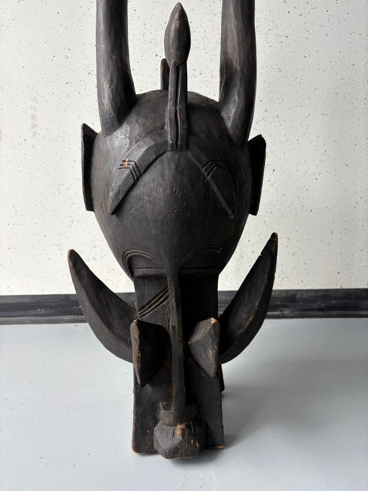 Origineel Afrikaans Masker, Ophalen