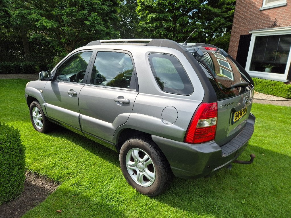 Kia Sportage 2.0 2WD 2006 Grijs nieuwe apk 2de eigenaar, Auto's, 1442 kg, Zwart, 4 cilinders, Leder en Stof