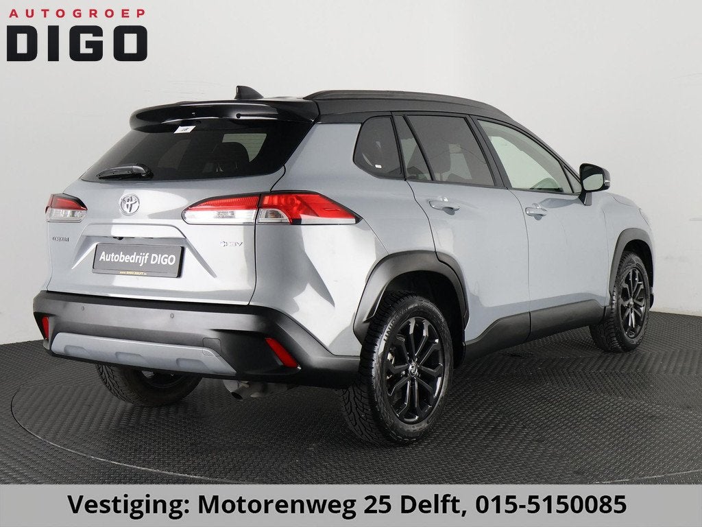 Toyota Corolla Cross HYBRID 140 BUSINESS INTRO BI-TONE GARAN, Auto's, Toyota, Stof, Gebruikt, Euro 6, Blauw