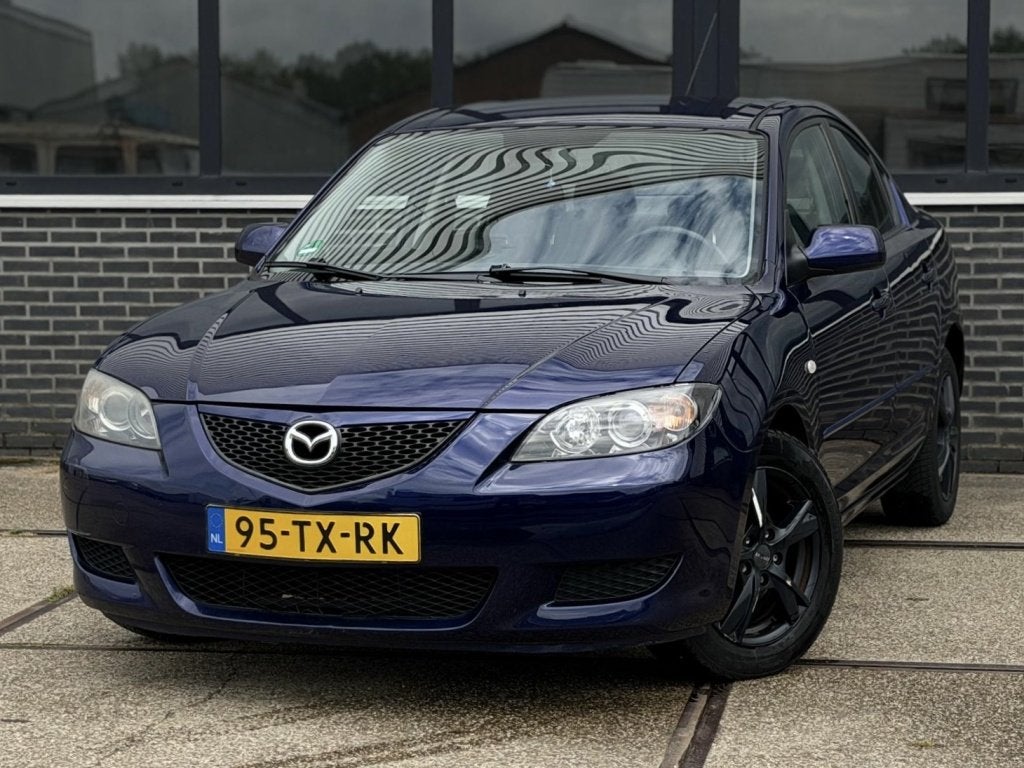 Mazda 3 1.6 Touring Sportl. |Clima |CruiseC |1e eigenaar |NA, Gebruikt, 4 cilinders, Blauw, 49 €/maand