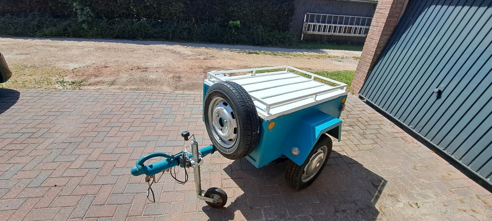 Compacte aanhanger met deksel en reservewiel, Ophalen of Verzenden, Gebruikt