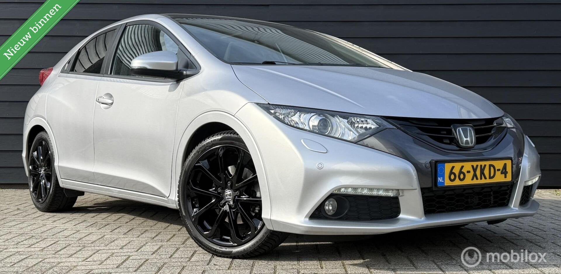 Honda Civic 1.8 Sport Pano.dak/Winterpakket/Leder/Clima/Crui, Gebruikt, 4 cilinders, Met garantie (alle), Origineel Nederlands