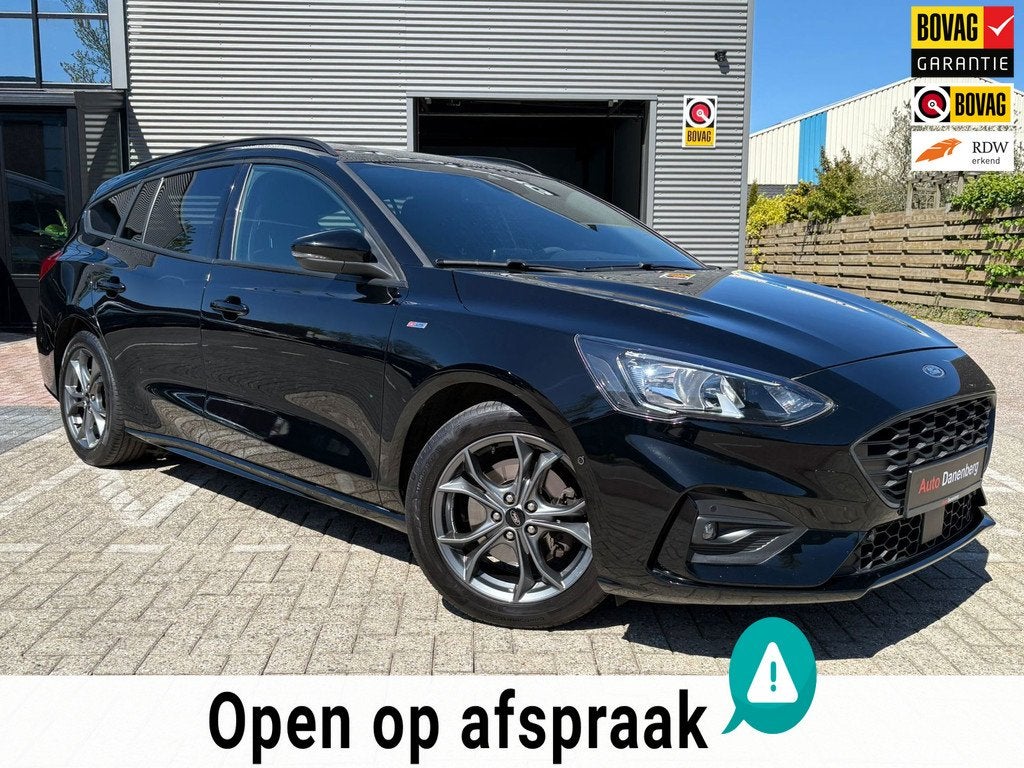 Ford Focus Wagon 1.0 EcoBoost ST Line Automaat Weinig KM, Auto's, Ford, Zwart, 1283 kg, Zwart, Origineel Nederlands