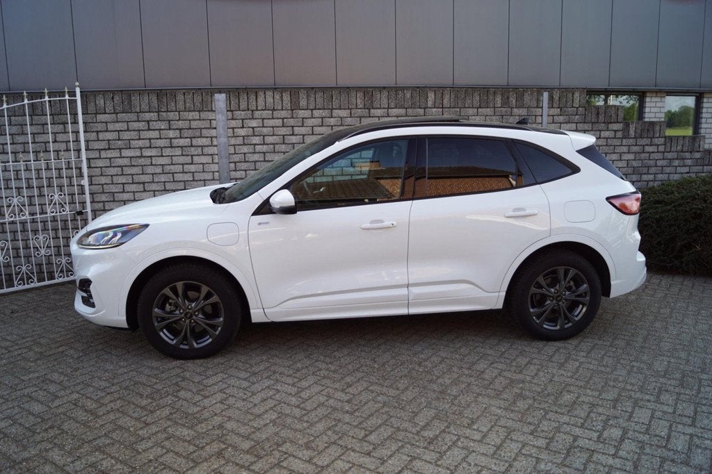 Ford KUGA 2.5 PHEV ST-Line X Autom Panodak Stoel/Stuur Voorr, Auto's, Ford, Gebruikt, 4 cilinders, Wit, Plug-in hybride
