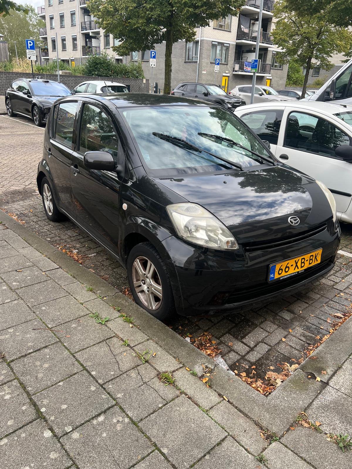 Daihatsu Sirion 1.0 51KW 2007 Zwart, Auto's, Voorwielaandrijving, Zwart, Handgeschakeld, 3 cilinders