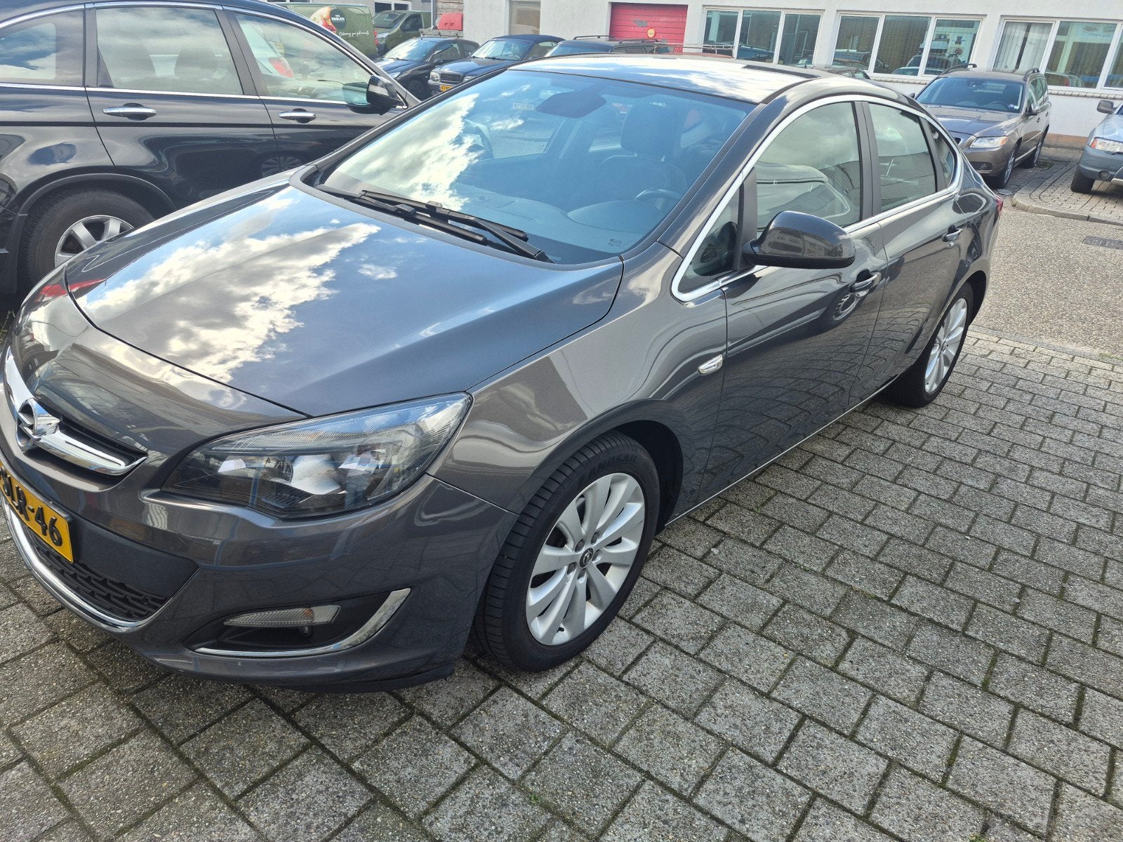 Opel Astra 1.4 Turbo Ecotec 103KW 4-D 2013 Grijs, Auto's, Voorwielaandrijving, 1250 kg, 4 cilinders, 700 kg