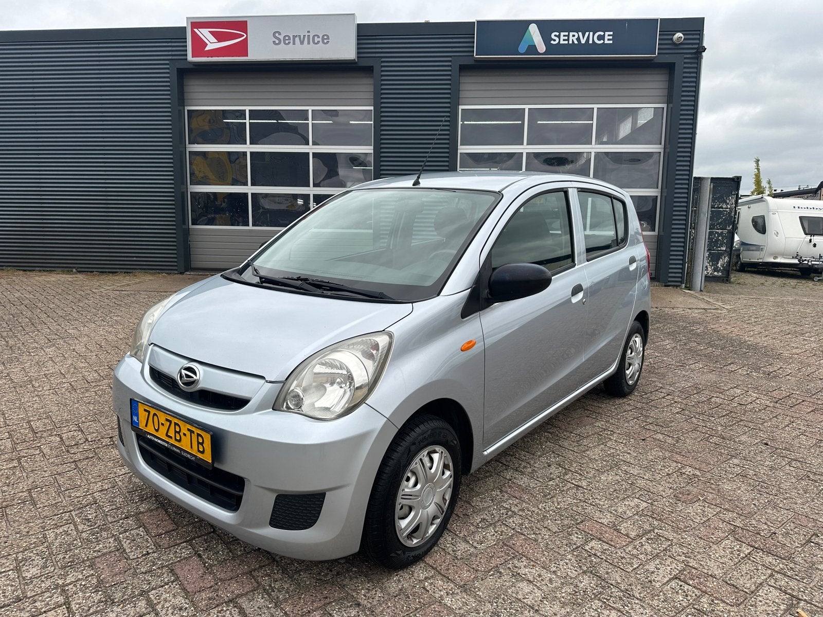 Daihatsu Cuore 1.0 5D AUT 2007 Grijs Airco, Auto's, Dealer onderhouden, 600 kg, 18 €/maand, 4 stoelen