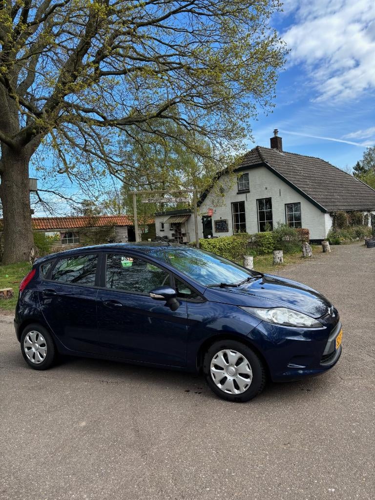 Ford Fiësta 1.25 44KW 5DR 2012 Blauw, Auto's, Voorwielaandrijving, Stof, 40 €/maand, 1242 cc