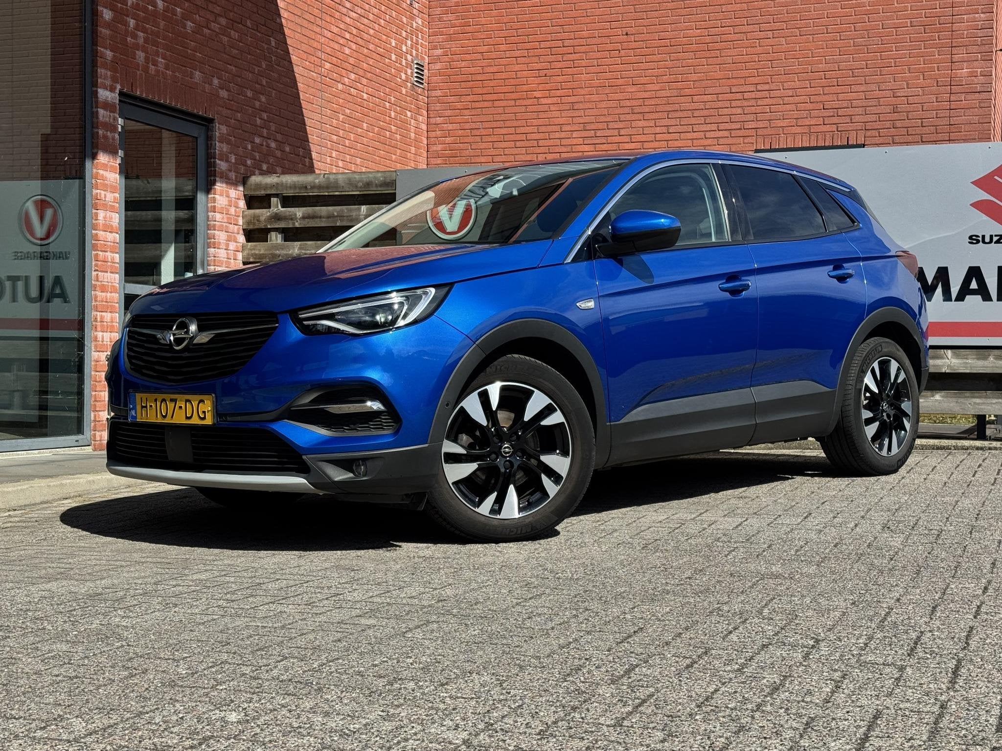Opel Grandland X 1.2 Turbo Business Executive Camera, Apple, Auto's, Voorwielaandrijving, Gebruikt, 1199 cc, Leder en Stof