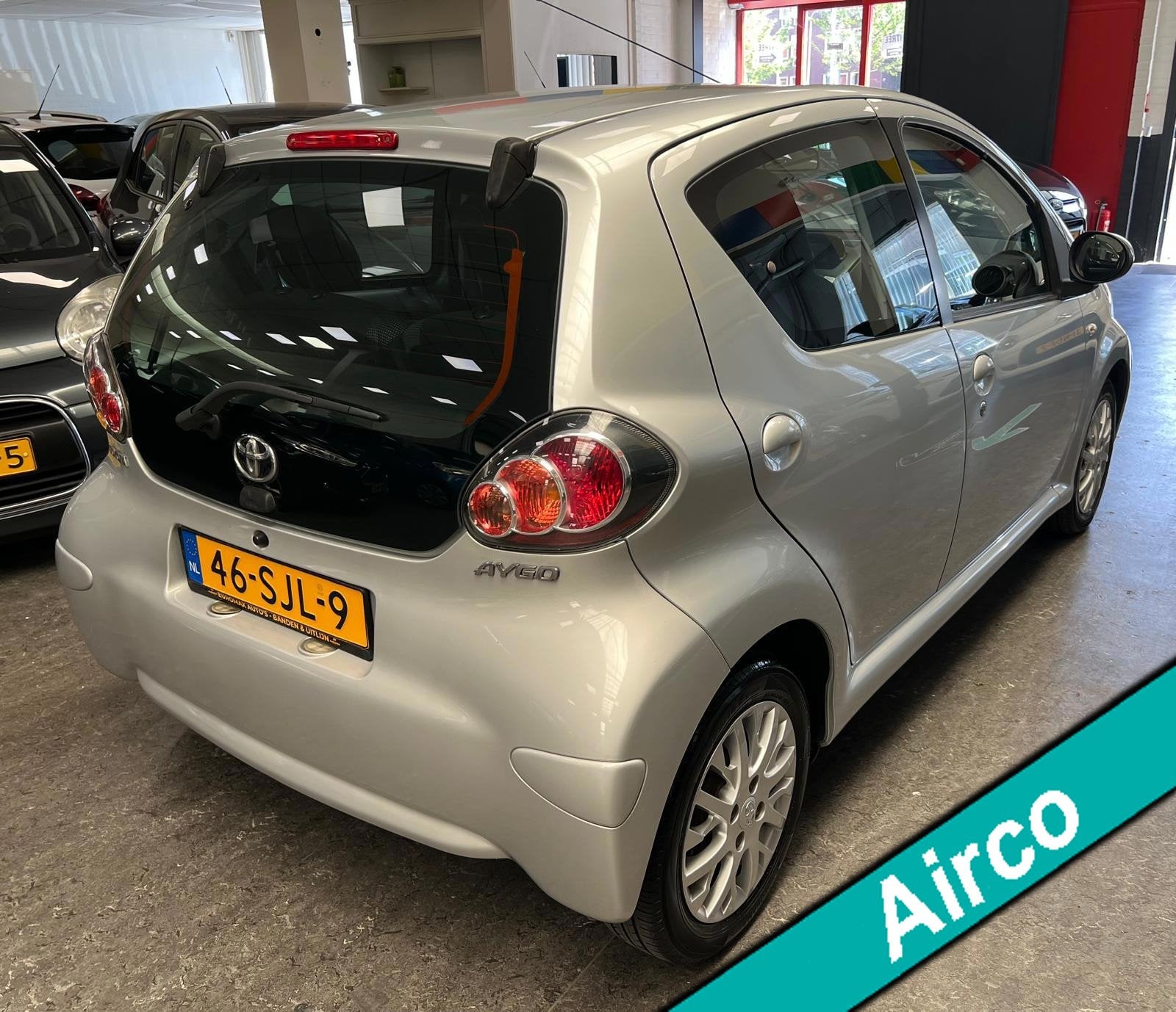Toyota Aygo 1.0-12V Comfort 2e Eigenaar - NAP - Navigatie -, Auto's, Toyota, Voorwielaandrijving, Euro 5, Stof, Gebruikt
