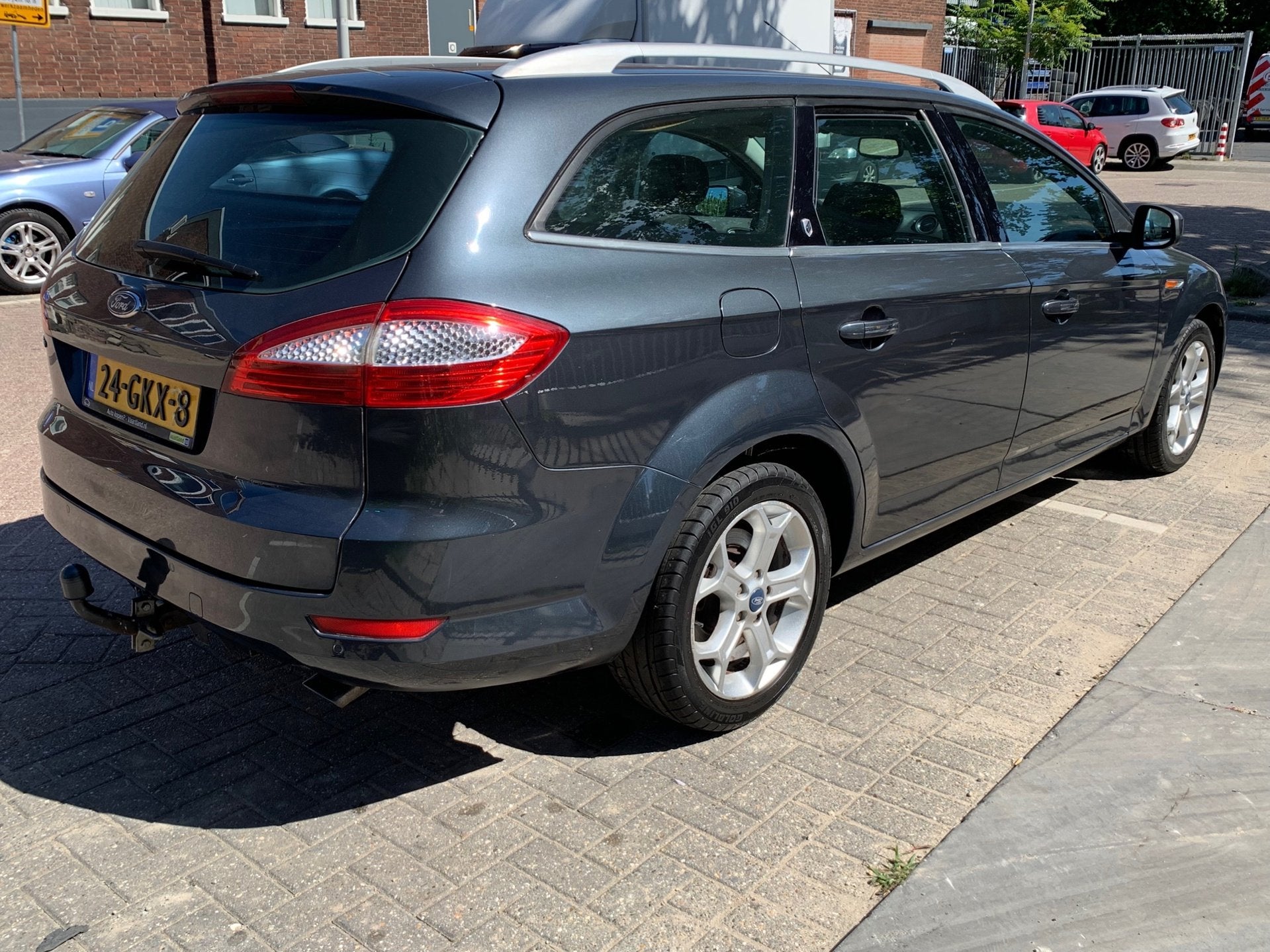 Ford Mondeo Wagon 2.3-16V Ghia|Automaat|Navigatie|Climate Co, Stof, Gebruikt, Zwart, 4 cilinders