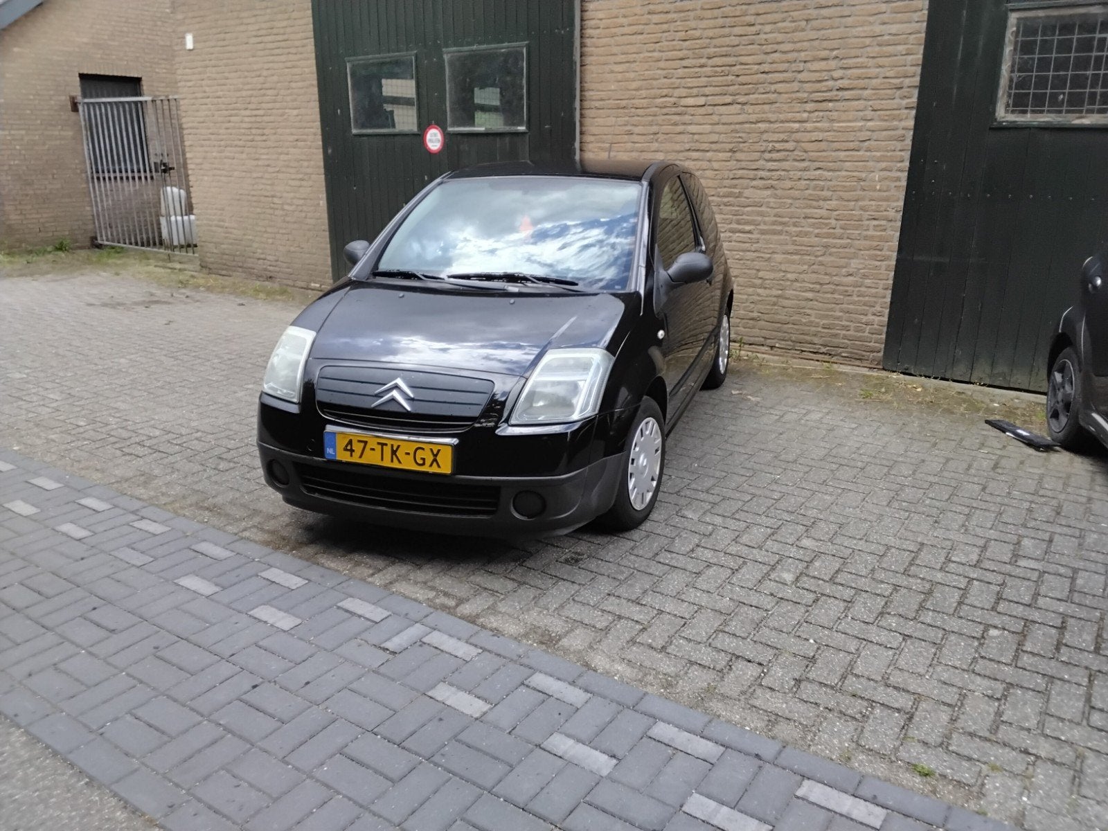 Citroën C2 1.1 I 2006 Zwart, Auto's, 4 cilinders, 4 stoelen, Zwart, Origineel Nederlands