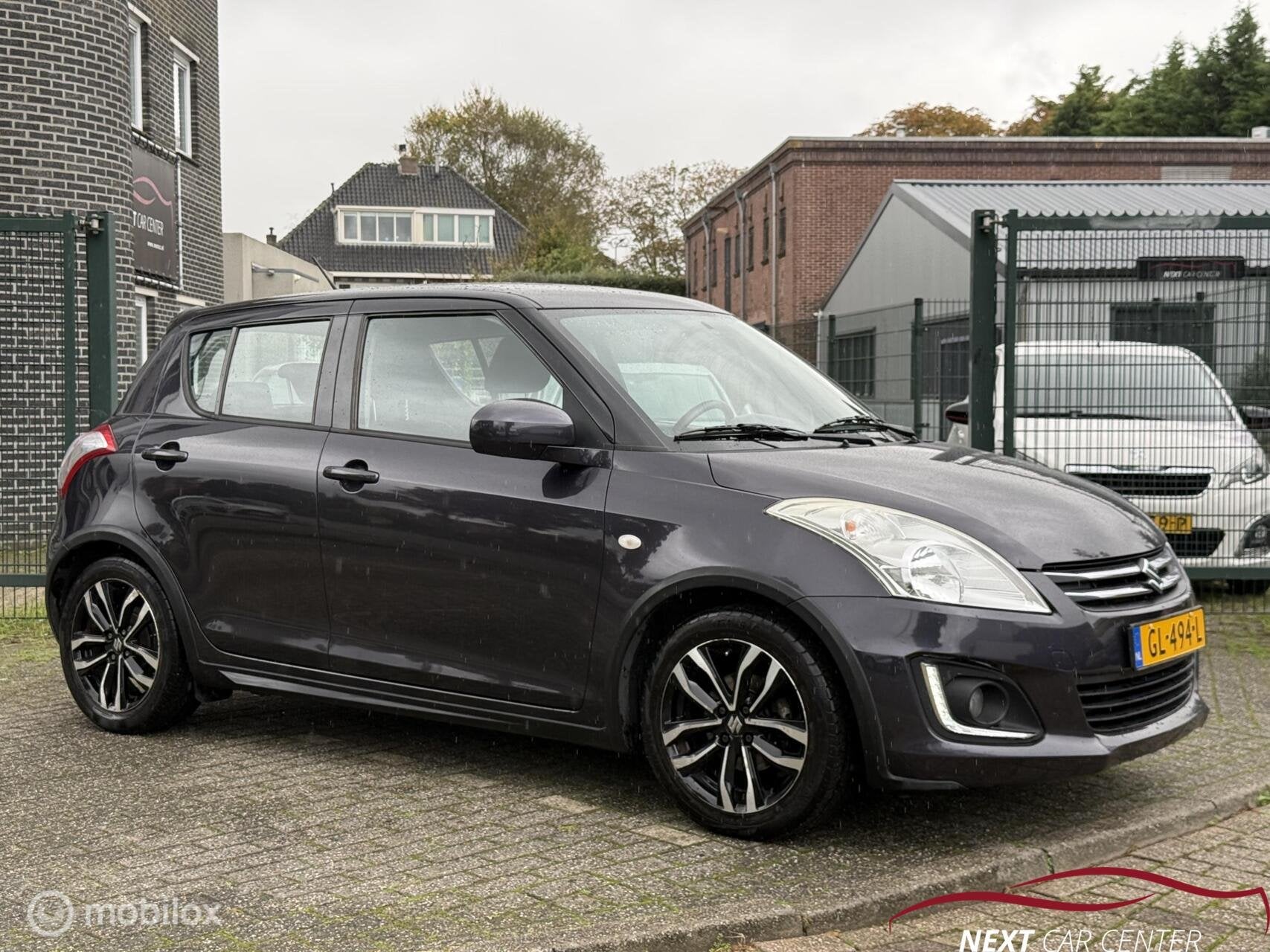 Suzuki Swift 1.2 Exclusive EASSS DEALER onderhouden, Auto's, Gebruikt, 4 cilinders, 400 kg, Origineel Nederlands