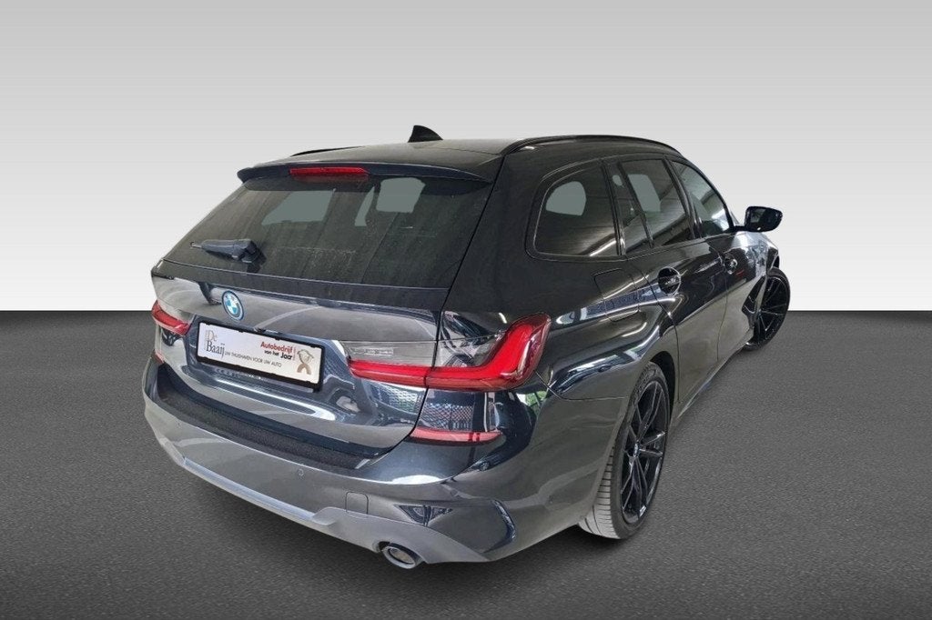 BMW 3 Serie Touring 320e M Sport | Half leer | 19" Licht met, 1998 cc, Gebruikt, Zwart, 4 cilinders