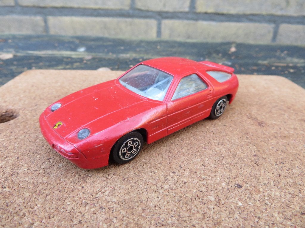 Burago Porsche 928 S4 1:43, Hobby en Vrije tijd, Ophalen of Verzenden, Zo goed als nieuw, Auto, Overige merken