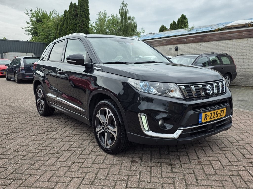 Suzuki Vitara 1.4 B.jet AllGRIP Stijl automaat, panoramadak., Auto's, Automaat, Dealer onderhouden, 1195 kg, Gebruikt