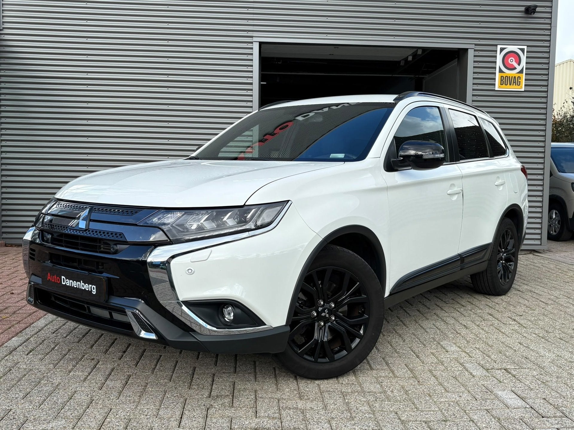 Mitsubishi Outlander 2.0 Benzine 4WD AUTOMAAT,LEER,CAMERA, 7, Auto's, 4 cilinders, 150 pk, 7 stoelen, Wit