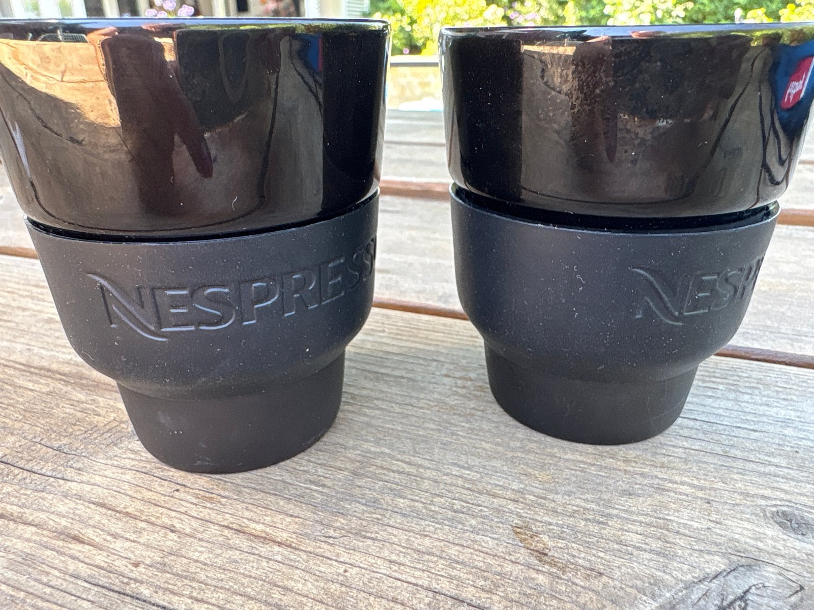 2 Nespresso koffiekopjes met siliconen houder - 2 stuks, Ophalen of Verzenden, Zwart, Steen/keramiek, Overige merken