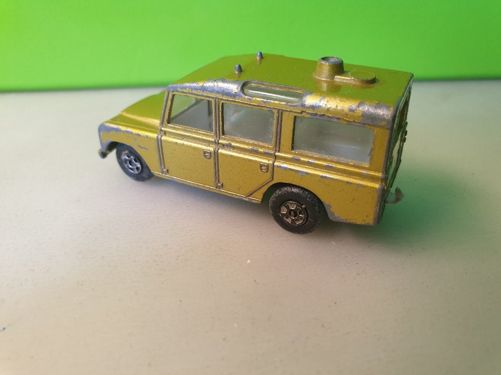 Matchbox 12 - Safari Land Rover 109 Wagon (goud) 1/72, Ophalen of Verzenden, Gebruikt, Auto