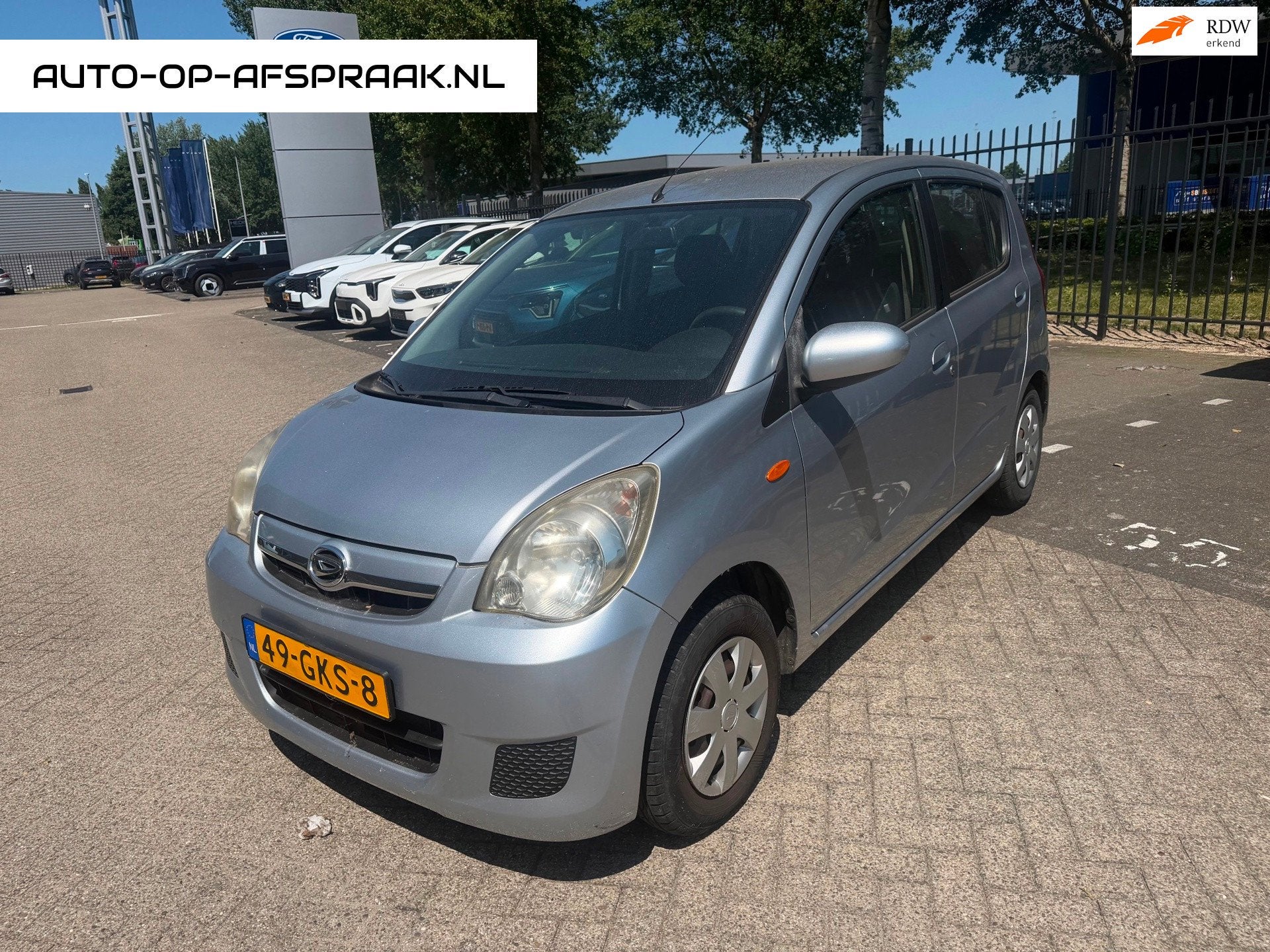 Daihatsu Cuore 1.0 Premium 5drs. Airco Trekhaak, Voorwielaandrijving, Stof, 18 €/maand, 4 stoelen