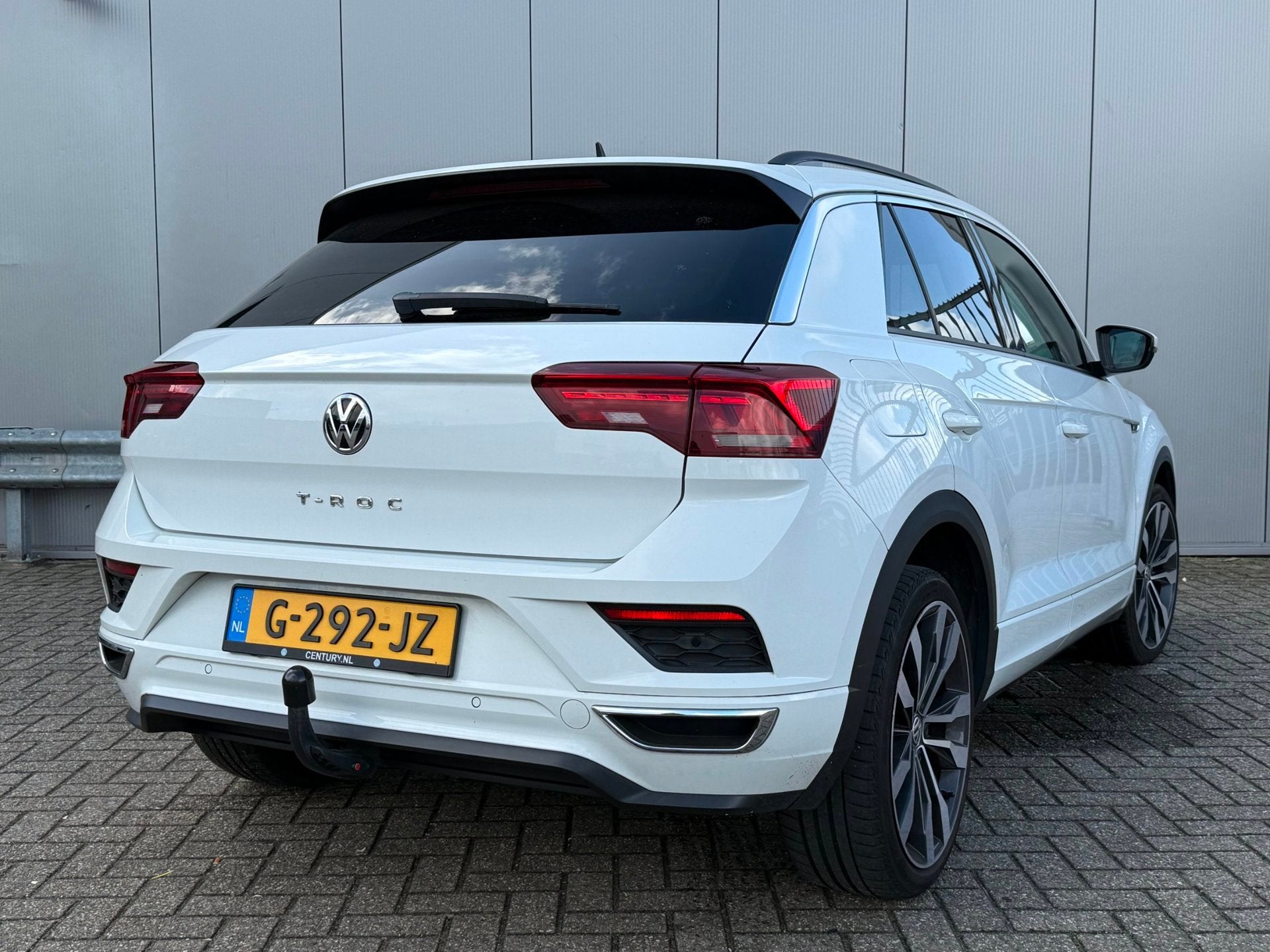 Volkswagen T-Roc 1.5 TSI Sport | 3x R-Line | Panoramadak | S, Auto's, Volkswagen, 4 cilinders, 150 pk, Leder en Stof, Wit