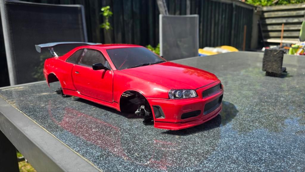 Grk gs2 evo met Nissan Skyline R34 Body, Hobby en Vrije tijd, Modelbouw | Auto's en Voertuigen, Overige merken, Gebruikt, 1:50 of kleiner