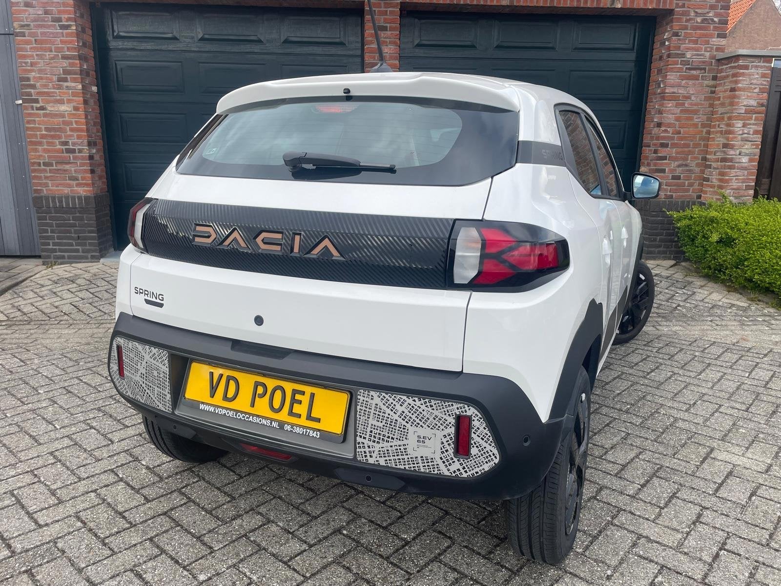 Dacia Spring Extreme 65 26.8 kWh NIEUWSTAAT NAVI AIRCO PDC, Auto's, Dacia, Gebruikt, Parkeersensor, 4 stoelen, Leder en Stof