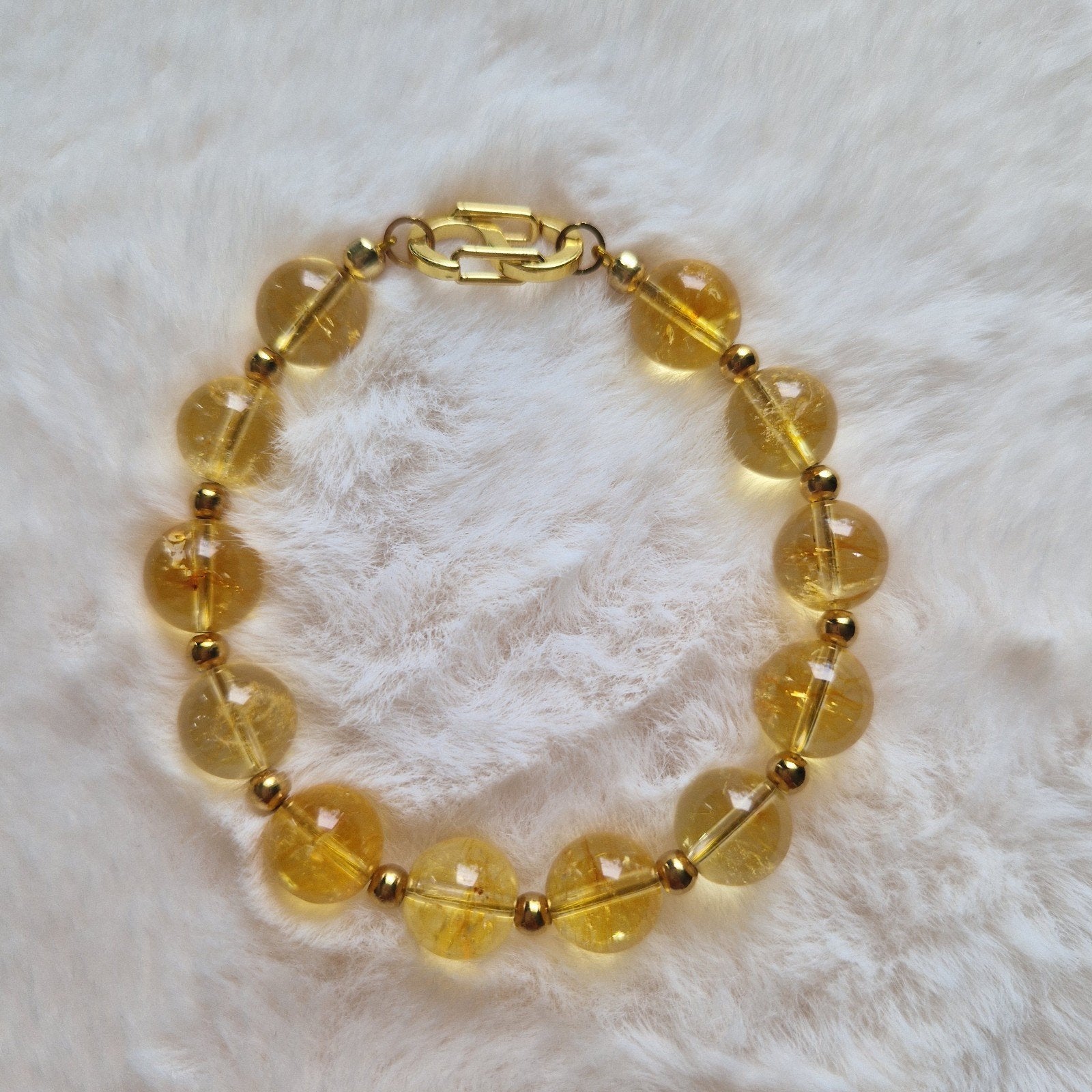 Armband met echte edelsteen kralen en RVS sluiting, Staal, Geel, Ophalen of Verzenden, Met bedels of kralen
