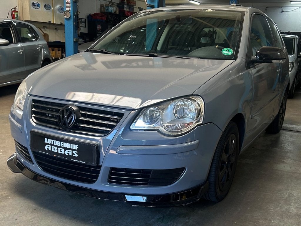 Volkswagen Polo 1.4-16V Turijn (bj 2006), Auto's, Volkswagen, Elektrische ramen, 15 km/l, Gebruikt, Zwart