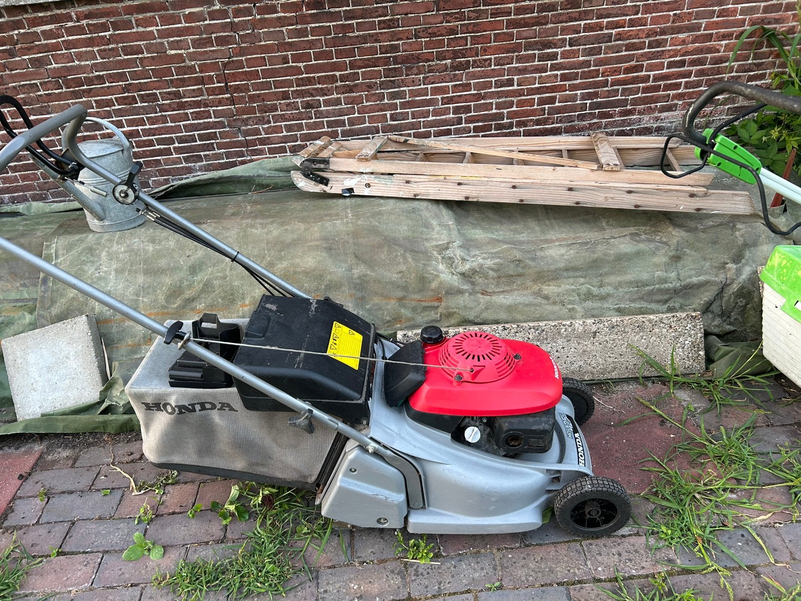 grasmaaier, Ophalen, Zo goed als nieuw