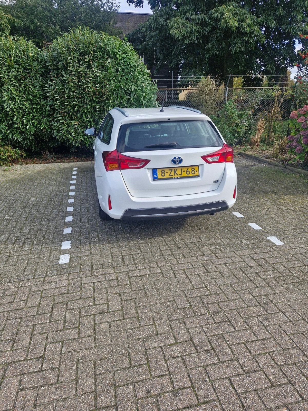 Toyota Auris 1.8 Hybrid Touring Sports CVT 2015 Wit, Auto's, Dealer onderhouden, Zwart, 345 kg, Adaptive Cruise Control