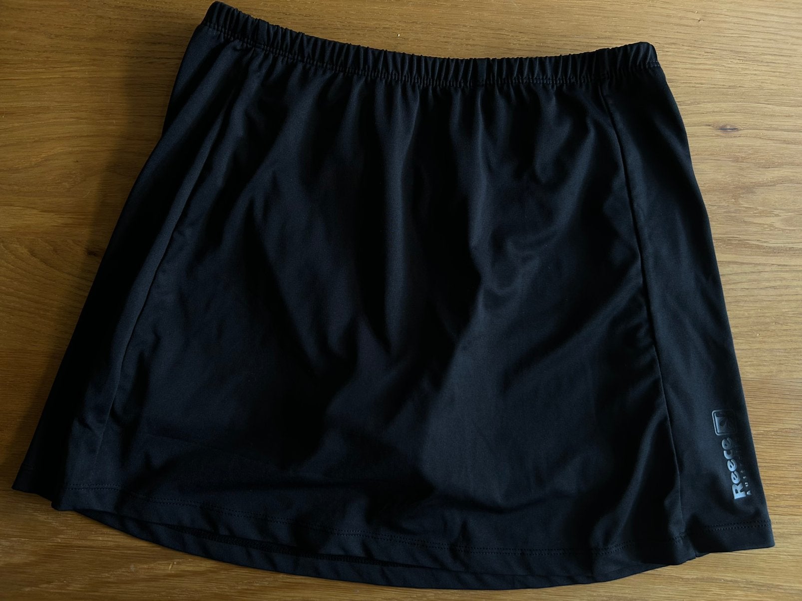 Hockeyrokje zwart maat L van Reece, Ophalen of Verzenden, Zo goed als nieuw, Kleding