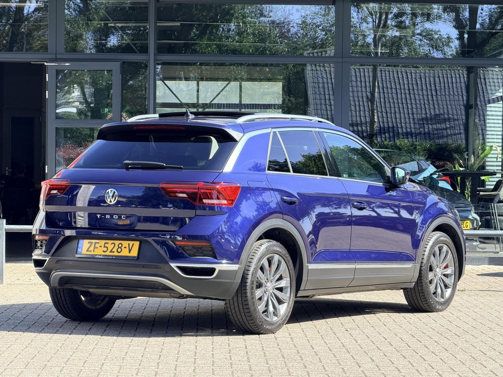 Volkswagen T-Roc 1.5 TSI Sport | Navi | Leer | Clima | Pano, Auto's, Volkswagen, Voorwielaandrijving, 4 cilinders, 150 pk, Blauw