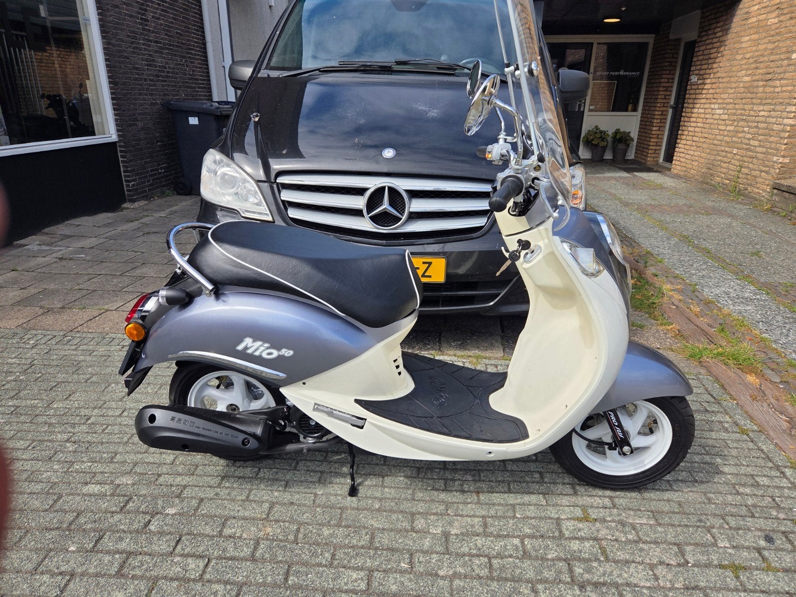 Sym mio 25km 2016 in nieuwstaat, Mio, Ophalen of Verzenden, Zo goed als nieuw, Benzine