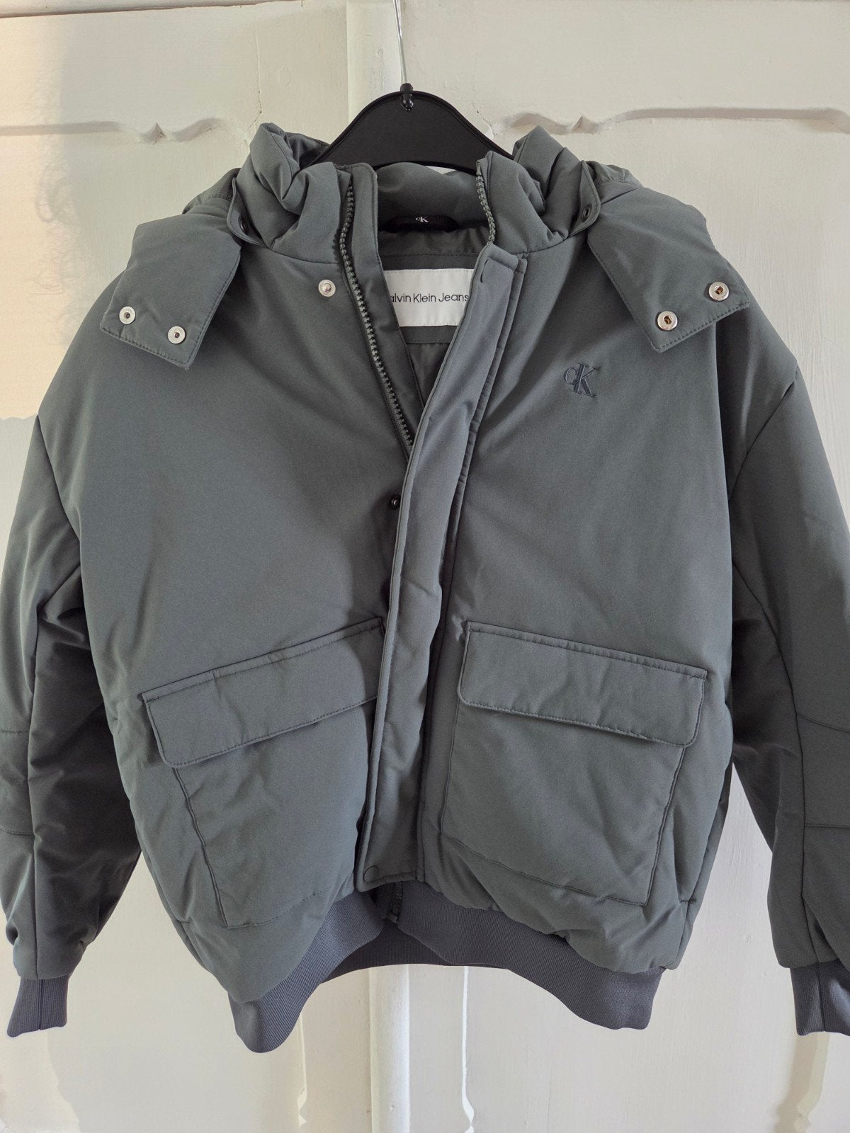 Nieuwe stoere Calvin Klein winterjas mt 152 grijs, Jongen of Meisje, Nieuw, Jas, Calvin Klein