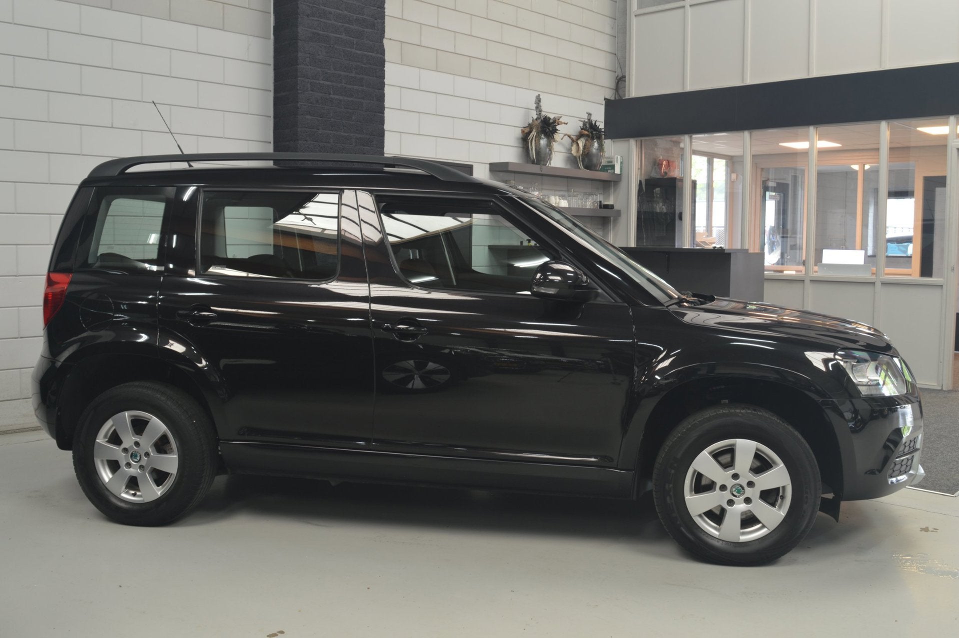 Skoda Yeti 1.2 TSI Greentech Edition // AIRCO // CRUISE // T, Voorwielaandrijving, Stof, 4 cilinders, Zwart