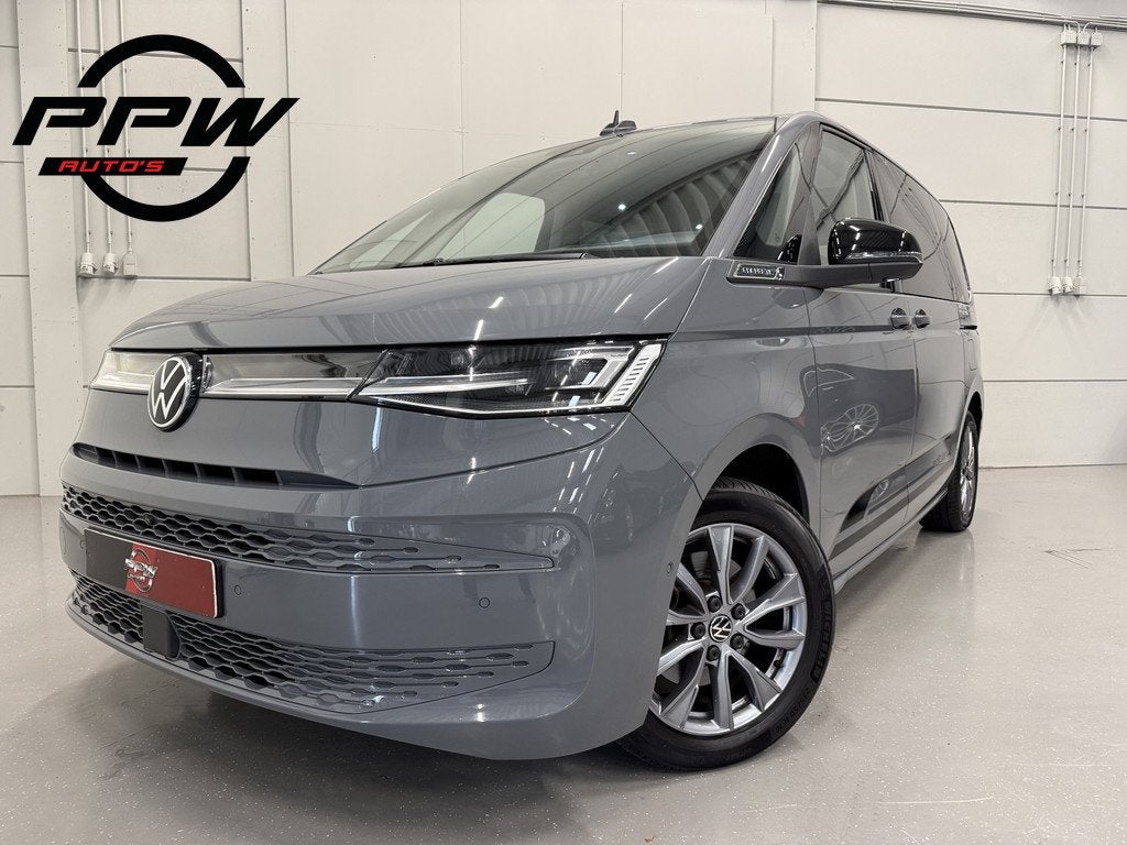Volkswagen Multivan 1.4 eHybrid EDITION 7p. PANO/HEAD-UP/LEE, Auto's, Gebruikt, Zwart, Met garantie (alle), 7 stoelen