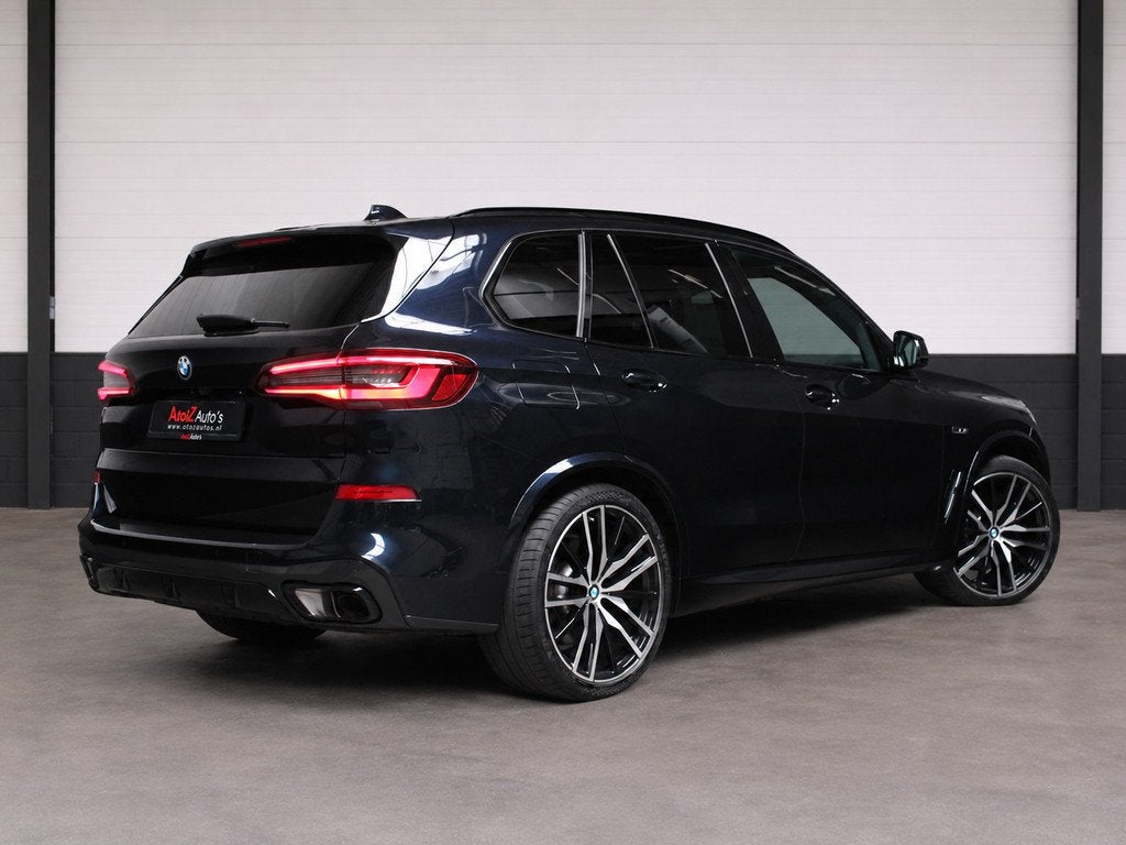 BMW X5 XDrive45e M-Sport l Pano H/K Laser ACC HUD Memory, Gebruikt, 394 pk, Met garantie (alle), Zwart